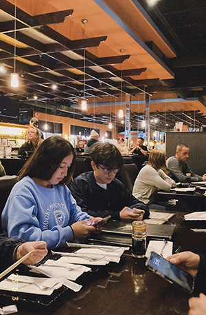 two people on their phones